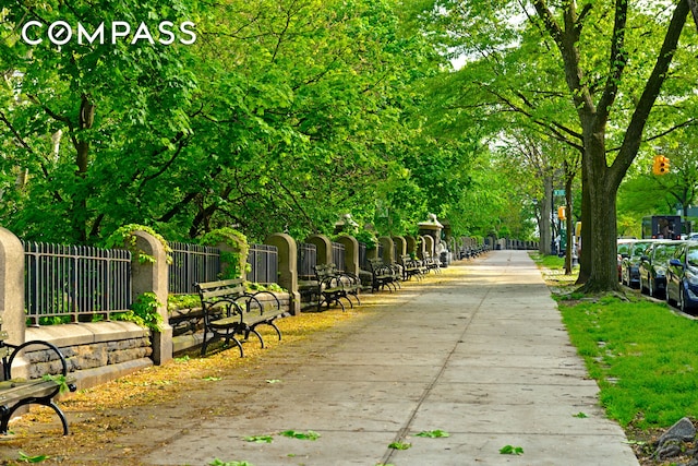 surrounding community featuring fence