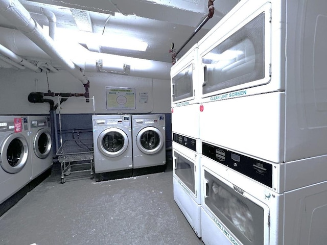 washroom featuring washing machine and clothes dryer and stacked washer / dryer