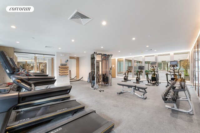 exercise room featuring recessed lighting and visible vents