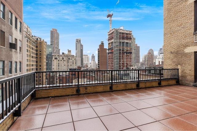 view of patio with a balcony