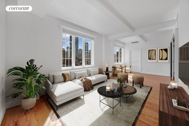 living room featuring hardwood / wood-style floors and beamed ceiling