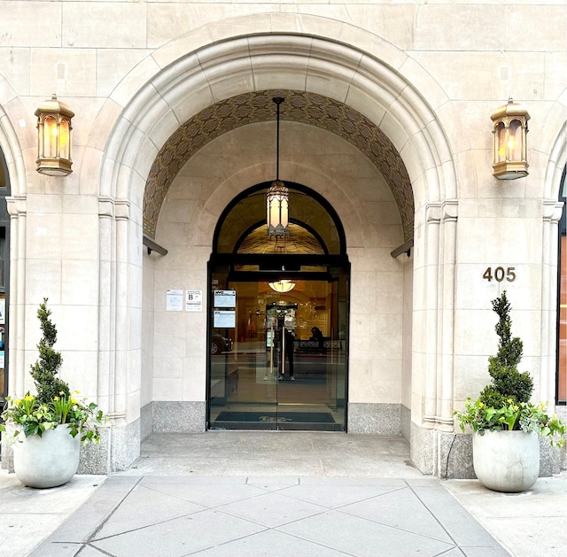 view of exterior entry with stone siding