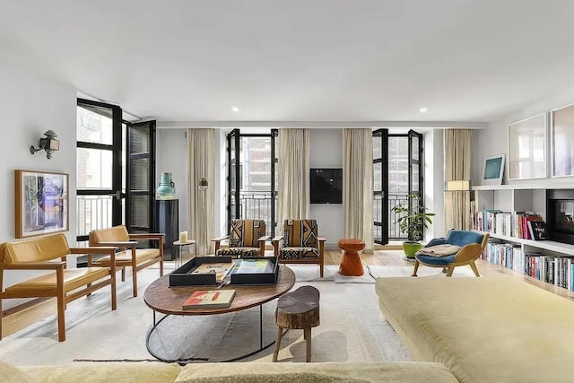 living room with floor to ceiling windows