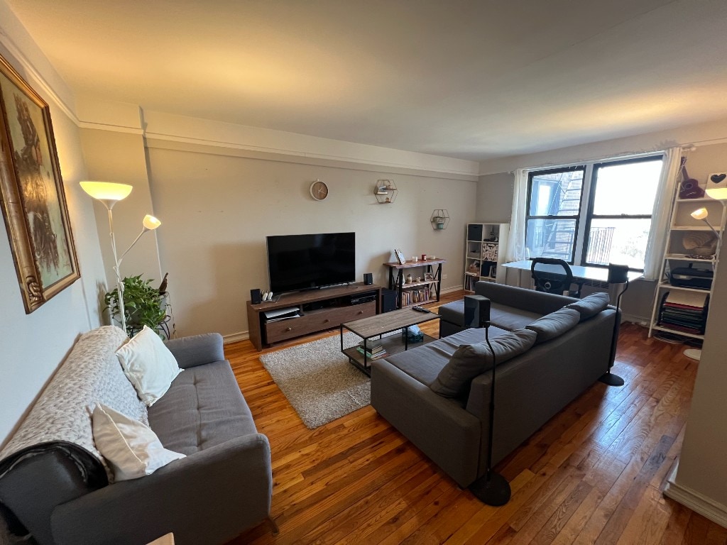 285 E 35th St Unit 5B, New York City, NY 11203 - living room with hardwood / wood-style floors