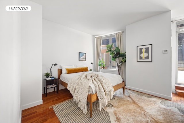 bedroom featuring wood-type flooring