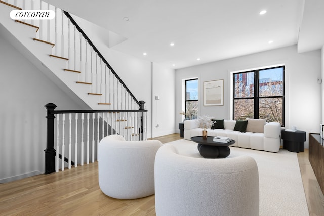 living area featuring recessed lighting and light wood-type flooring