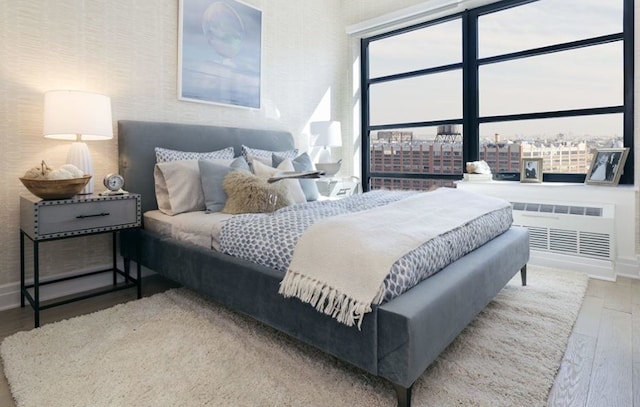 bedroom featuring hardwood / wood-style flooring