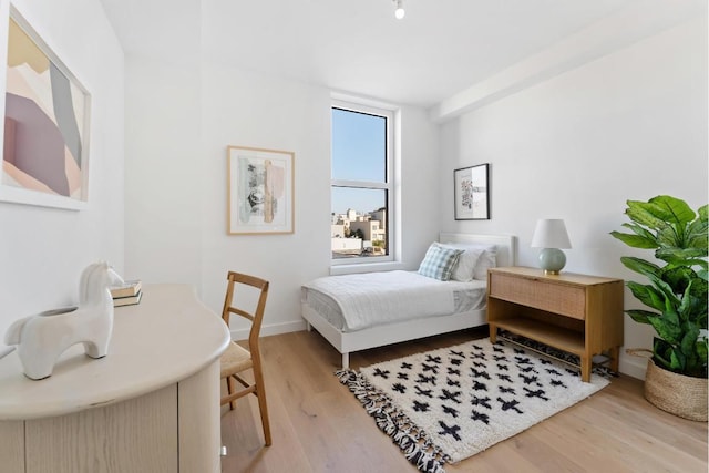 bedroom featuring light hardwood / wood-style floors