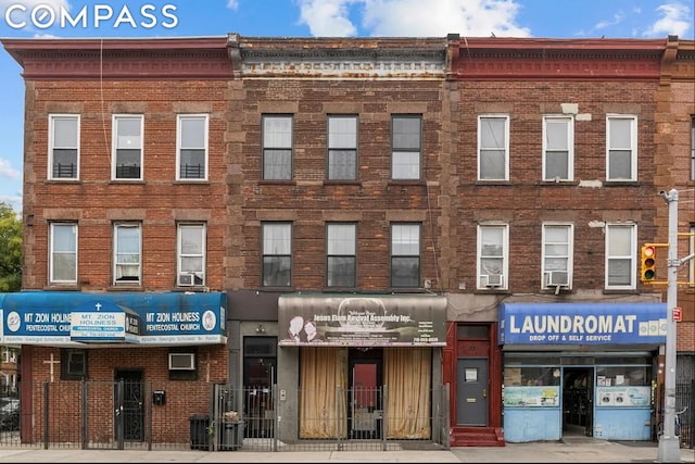 view of building exterior featuring cooling unit