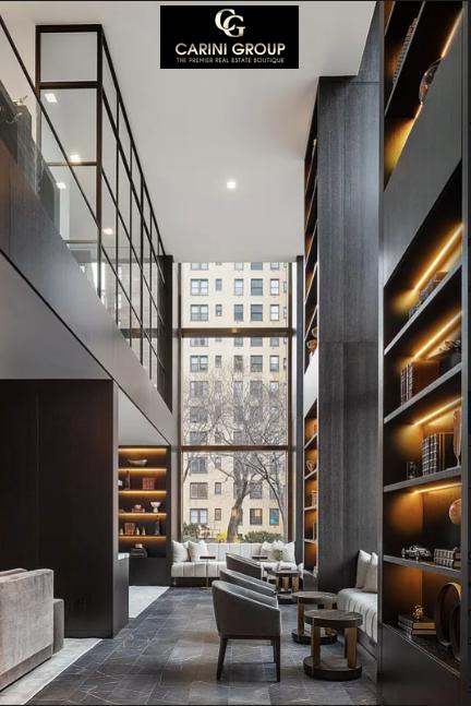 845 United Nations Plz Unit 36C, New York City, NY 10017 - building lobby with expansive windows and a high ceiling