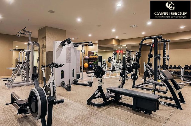 exercise room featuring recessed lighting and visible vents