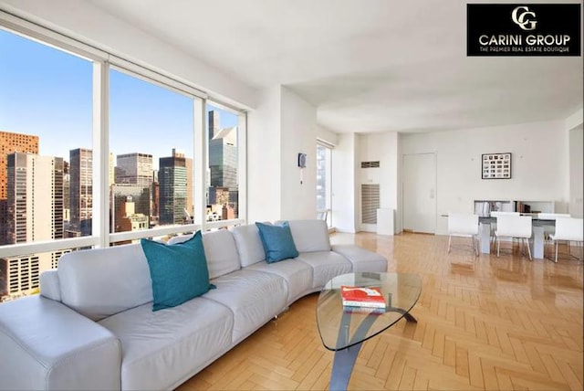 living room featuring light parquet floors