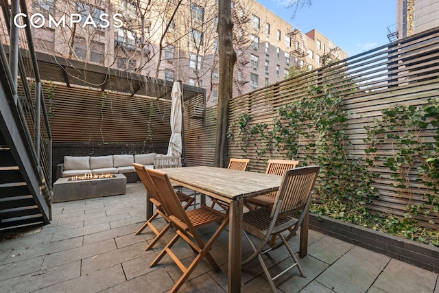 view of patio / terrace with outdoor lounge area and outdoor dining space