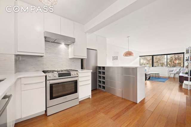 kitchen featuring stainless steel appliances, range hood, white cabinets, and light countertops