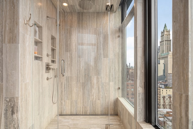 full bathroom with a shower stall