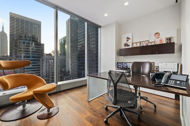 50 W 47th St Unit 1808, New York City, NY 10036 - office with wood finished floors, floor to ceiling windows, and a city view