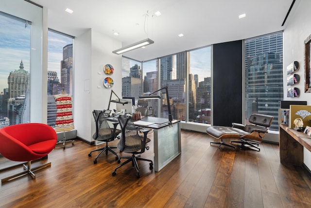 50 W 47th St Unit 1808, New York City, NY 10036 - office area with a skyline view, expansive windows, and wood-type flooring
