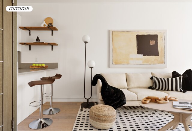 living room with light hardwood / wood-style flooring