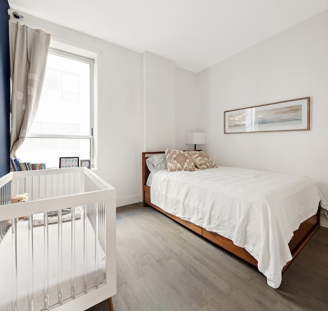 bedroom featuring hardwood / wood-style floors