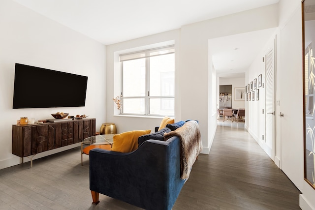 416 W 52nd St Unit 306, New York City, NY 10019 - living area featuring wood finished floors and baseboards