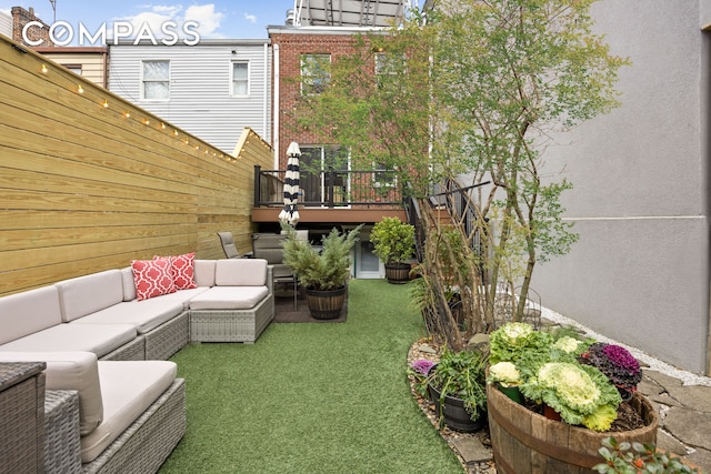 exterior space with outdoor lounge area and a deck