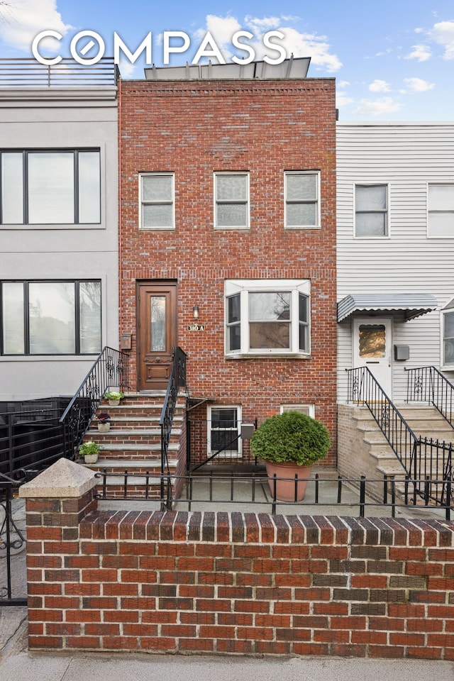 multi unit property with brick siding