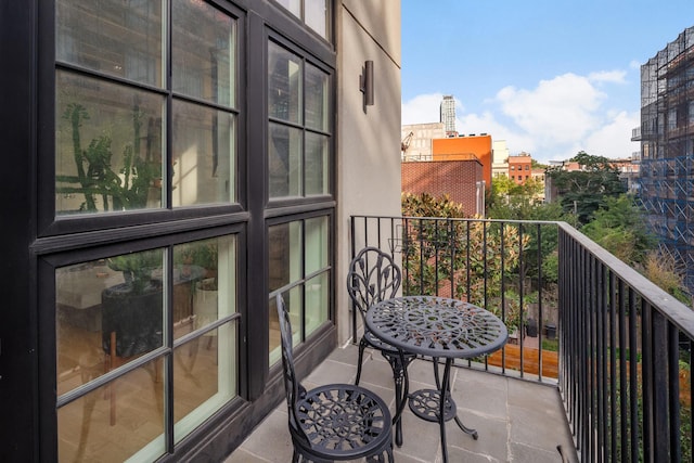 balcony featuring a city view