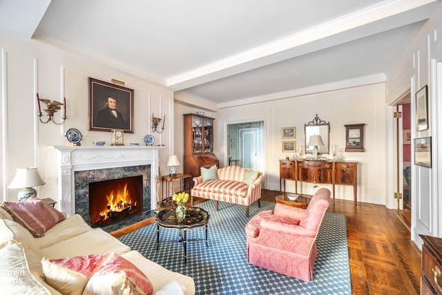 living room featuring parquet flooring and a premium fireplace