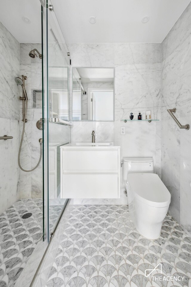 kitchen featuring sink, stainless steel appliances, white cabinets, and tasteful backsplash