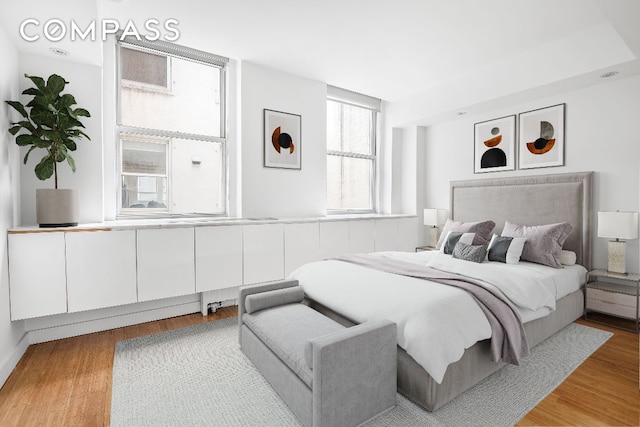 bedroom with light wood-type flooring