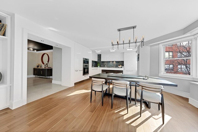 dining room featuring light wood-type flooring