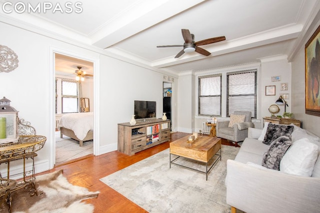 living room with beam ceiling, crown molding, parquet floors, and ceiling fan