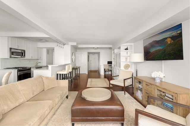 living area with wood finished floors