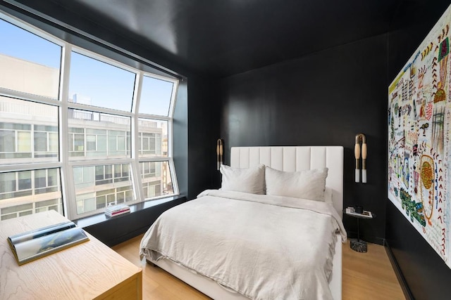 bedroom featuring light wood-type flooring