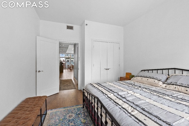 bedroom featuring a closet and hardwood / wood-style floors