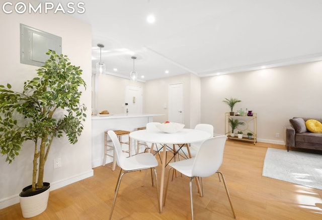 dining room with light wood-type flooring