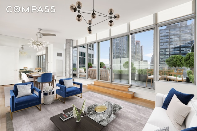 sunroom / solarium with a chandelier and a city view