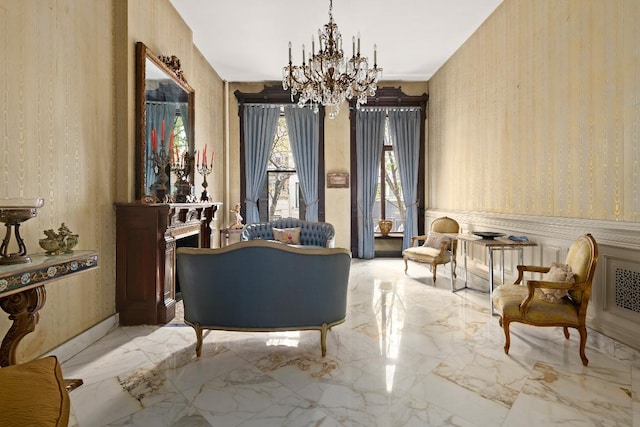 living area with an inviting chandelier