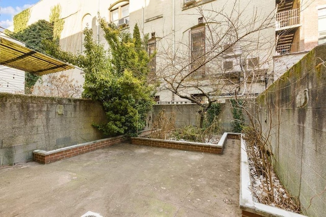 117 W 75th St Unit Twnh, New York City, NY 10023 - fenced backyard featuring a patio