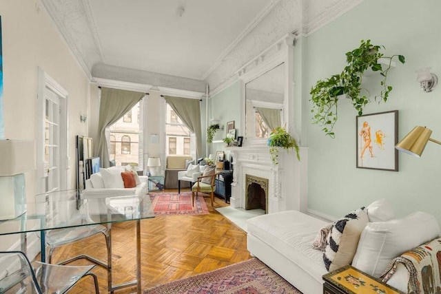 living room with crown molding and parquet flooring