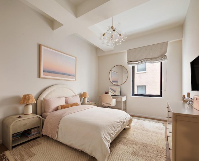 bedroom featuring an inviting chandelier, coffered ceiling, and beamed ceiling