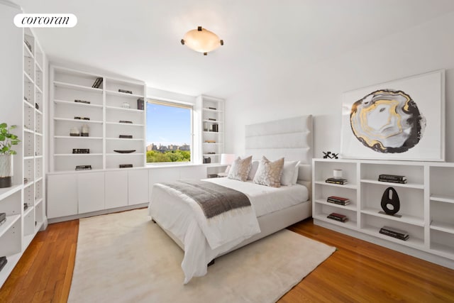 bedroom featuring wood-type flooring