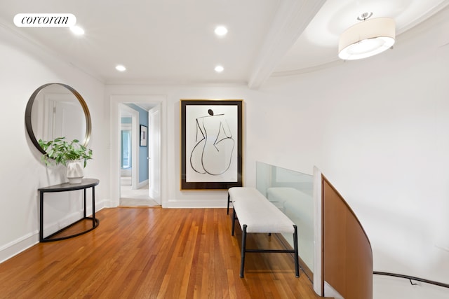 entrance foyer featuring baseboards, visible vents, hardwood / wood-style flooring, beamed ceiling, and recessed lighting