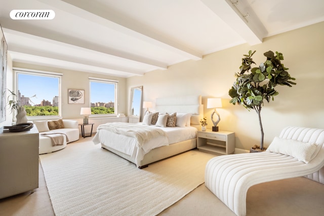 bedroom with beam ceiling