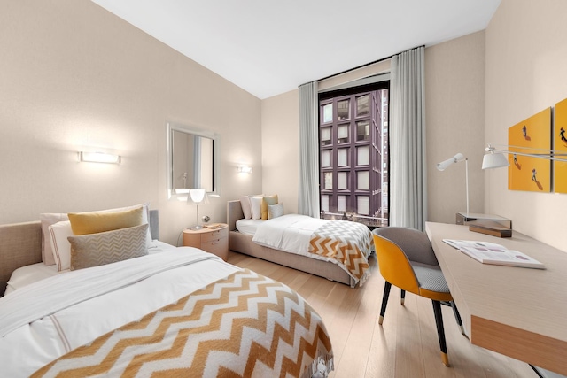 bedroom featuring wood finished floors