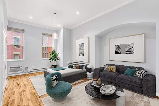23 Waverly Pl Unit 3B, New York City, NY 10003 - living room with a baseboard heating unit, a wall mounted AC, wood finished floors, ornamental molding, and recessed lighting