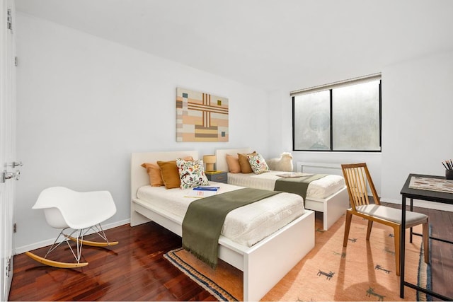 bedroom featuring hardwood / wood-style floors