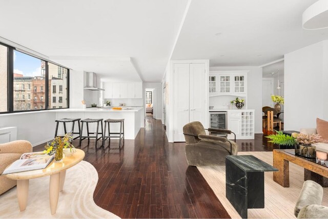 dining space with dark hardwood / wood-style floors and french doors