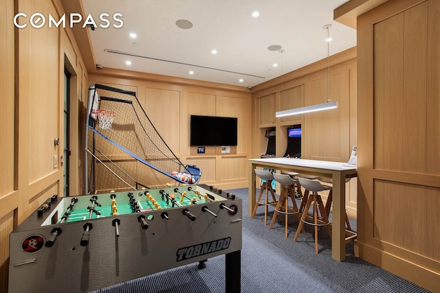 20 E End Ave Unit 4C, New York City, NY 10028 - rec room featuring carpet flooring, a decorative wall, and recessed lighting