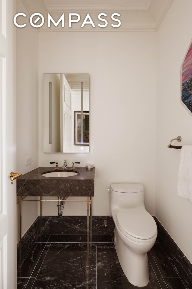 20 E End Ave Unit 4C, New York City, NY 10028 - half bath featuring marble look tile flooring, toilet, baseboards, and vanity
